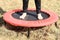 Feet on trampoline