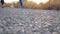 Feet of two women running at country road. Two young girls jogging outdoors. Female athletes training together at nature