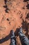 Feet in Wadi Rum Desert red sands