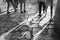 Feet walking on travertine floor in the Colosseum in Rome