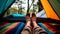 Feet wearing striped woollen socks in a tent