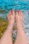 Feet of a woman relaxing in jacuzzi