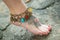 Feet of women in ethnic ornaments