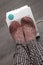 Feet with wool socks and electric heater