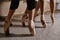 Feet of young ballerinas in pointe shoes close-up