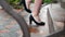 Feet young business woman walking to the office. the camera moves following the movement of women