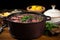 feijoada on the stovetop in a traditional black pot