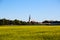 Feldmochinger church tower with rape field