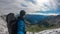 Feldseekopf - Hiker man with scenic view of majestic mountain peaks of High Tauern, Carinthia Salzburg, Austria.