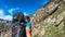 Feldseekopf - Hiker man with scenic view of majestic mountain peaks of High Tauern, Carinthia Salzburg, Austria.