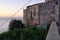 Feline colony during sunup on calamosca beach from capo sant`Elia lighthouse