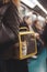 Feline Commuter: A Cat in a Carrier on a Busy Subway Train