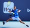 Felix Auger-Aliassime of Canada in action during round 3 match against Francisco Cerundolo of Argentina at 2023 Miami Open