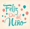 Feliz dia del nino - Happy children day text in spanish