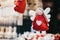 Felt red and white angel Christmas tree decorations on sale at a Christmas Market.