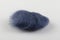 Felt wool dark blue color swatch. Shallow depth of field.