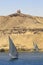 Felucca river boat on the Nile, with the Sahara behind in Aswa