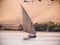 A felucca sailing on the river Nile in Egypt