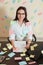 Female accountant in glasses sitting at workplace