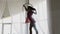 Female acrobatic performer make professional trick