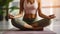 Female in Activewear Finding Serenity in Padmasana Pose During Yoga Session. Generative AI