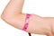 Female arm with tape measure around bicep