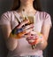 Female artist hands holding paintbrushes