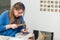 Female Artist working on stones mosaic