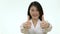 Female Asian nurse showing thumbs up with both hands
