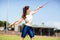 Female athlete carrying javelin on her shoulder