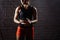 Female athlete clapping hands with chalk powder before strength training