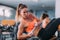 Female Athlete Doing Highly Effective Sit-Ups with Dumbbell