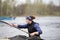 Female athlete engaged in rowing.Girl in a sports boat with oars