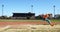 Female athlete practicing long jump at sports venue 4k