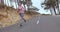 Female athlete running on country highway