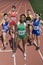 Female Athlete Standing On Race Track