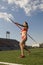 Female Athlete Throwing A Javelin