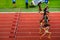 Female Athletes Compete in 100m Hurdles Race at Track and Field Contest for Worlds in Budapest