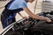 Female auto mechanic examine car engine breakdown problem in auto service