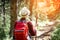 A female backpacking along a trail in the National Park.