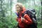 Female backpacking forest hiking.
