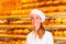 Female baker selling bread in bakery