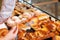 Female Bakery Worker\'s Hands Packing Bread