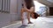 Female ballet dancer stretching before dancing 4k