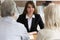 Female bank specialist speak consulting mature clients