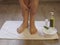 Female bare feet half a spa