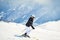 Female beginner skier ski downhill in scenic caucasus mountains steep downhill solo