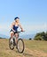 A female biker biking a mountain bike