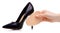 Female black leather high heels shoes insole in hand
