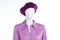 Female blouse and beret on mannequin.